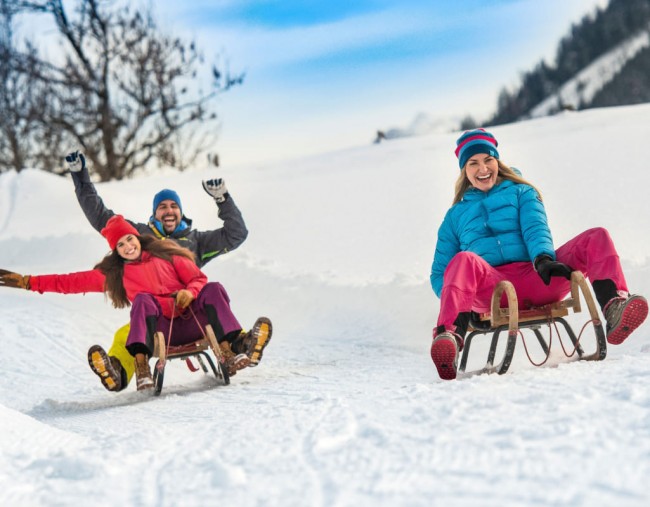 Rodeln auf den teils beleuchteten Rodelstrecken &copy;  Flachau Tourismus_Markus Berger