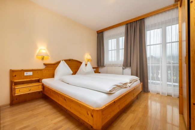 Schlafzimmer mit Balkon