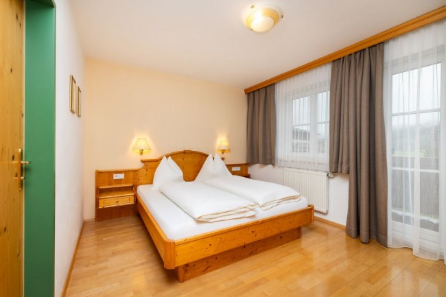 Schlafzimmer mit Balkon